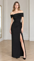 Front view of model wearing a black off-the-shoulder maxi evening dress with side slit