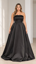 Full front view of black strapless satin pleated maxi ball gown on model