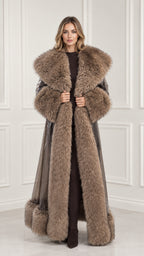 Front view of woman wearing taupe brown glossy maxi trench coat with plush faux fur collar, cuffs, and hem