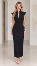 Front view of model wearing black split V-neck column maxi dress with cap sleeves