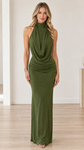 Front full-length view of model wearing olive green halter cowl neck maxi dress