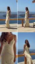 Ivory pearl-embellished scalloped tiered cami maxi dress modeled outdoors