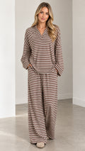 Front full-length view of model wearing the brown striped V-neck top and matching wide-leg lounge pants