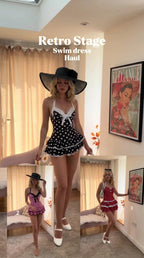 Front full view of black polka dot halter swim dress with bow and tiered lace ruffle skirt