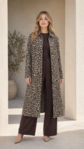 Front view of woman wearing Classic Tan leopard print longline duster coat