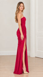 Side profile view of model wearing magenta strapless draped evening gown