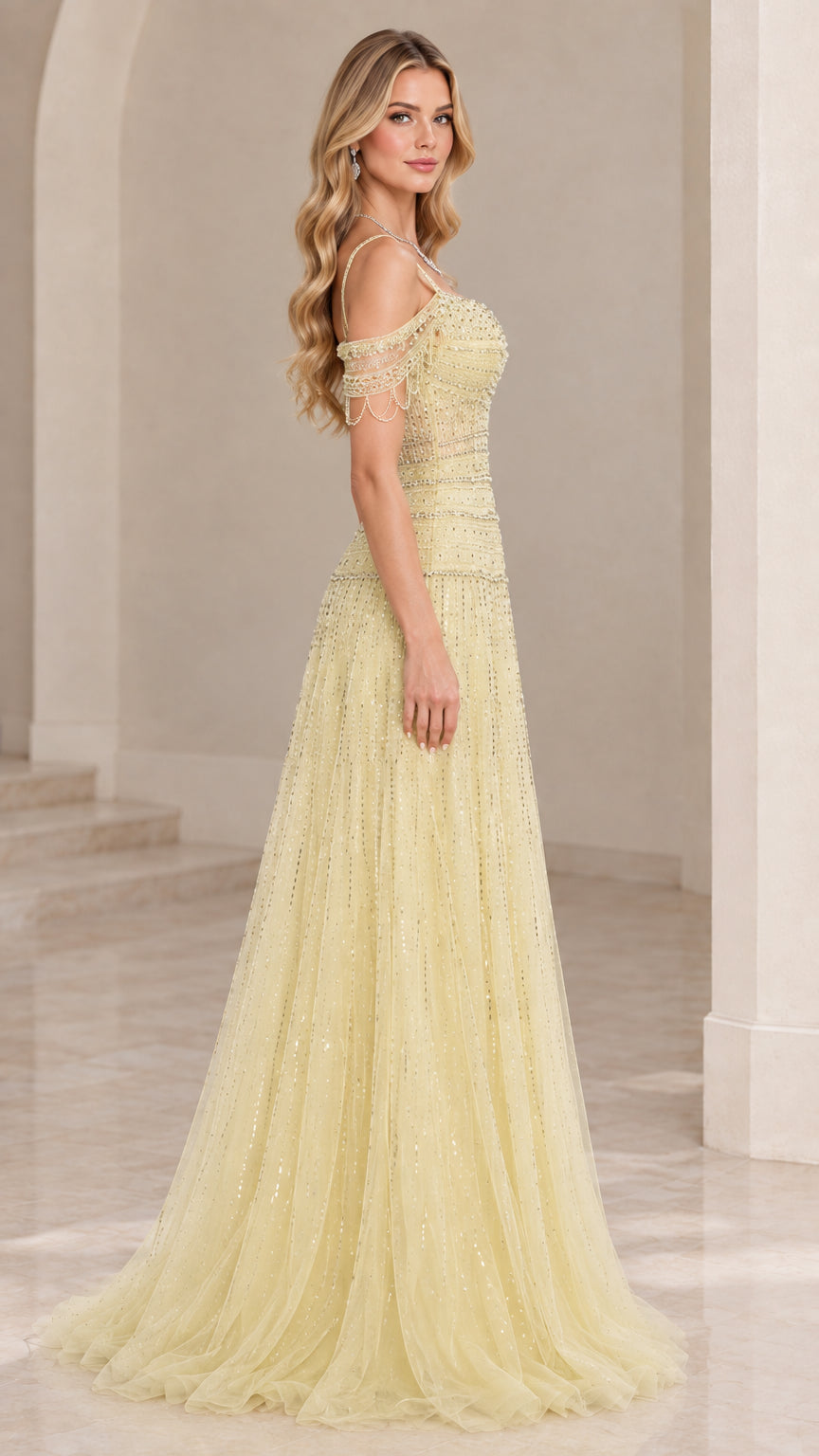 Side profile view of light yellow tulle formal gown showing silhouette