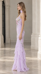 Side profile of model wearing lavender mermaid evening dress showing fitted waist and layered ruffled skirt
