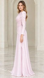 Side profile view of blush pink floor length formal gown showing flowing silhouette