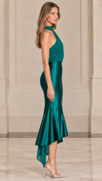 Side profile view of woman modeling emerald green one-shoulder satin cocktail dress
