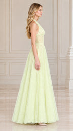 Side profile of model wearing light yellow halter corset lace evening gown