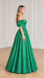 Side profile of emerald green off-shoulder sparkle evening dress with voluminous pleated skirt