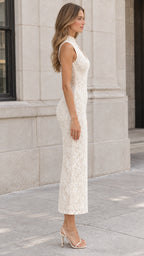 Side profile view of ivory sleeveless lace column maxi dress