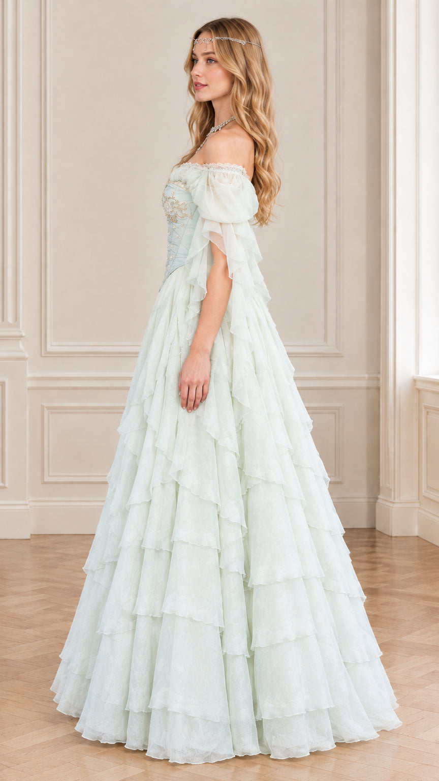 Side profile view of mint green fairycore ball gown with draped flutter sleeves