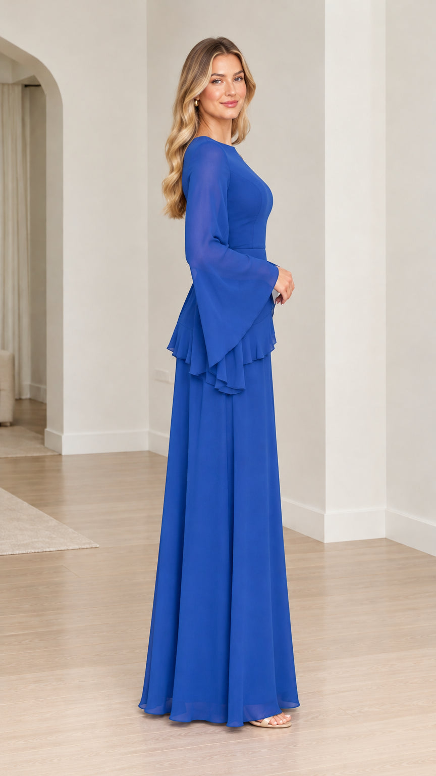 Side full-length view of royal blue chiffon maxi dress showing flared sleeves and silhouette