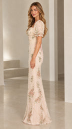 Side profile of model wearing Champagne floral embroidered evening dress