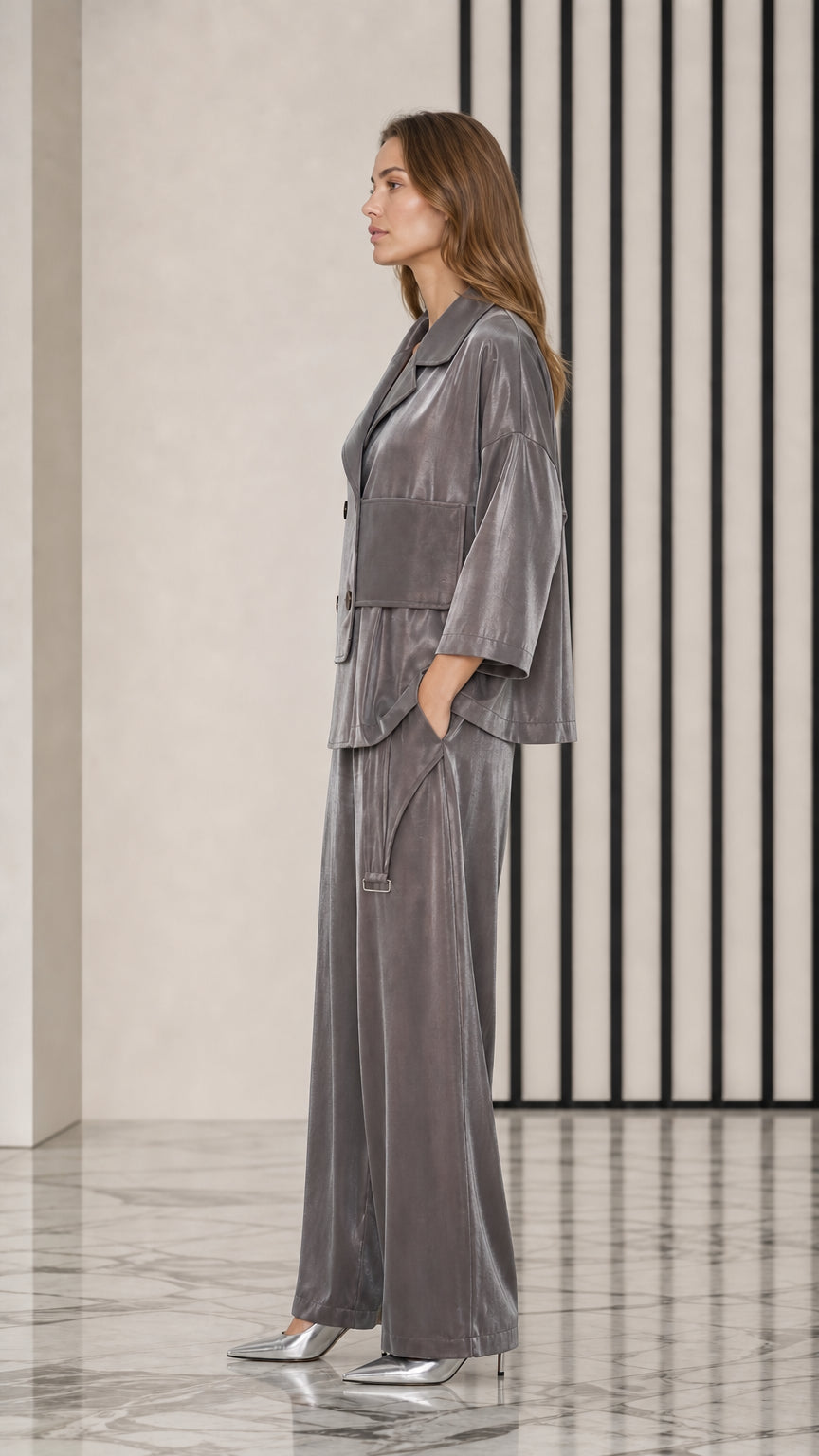 Side profile view of model in Slate Grey velvet pants set