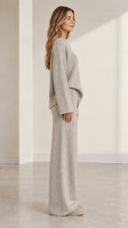 Side angle view of model wearing heather grey two-piece ribbed knit lounge set