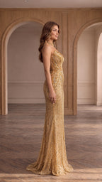 Side profile view of gold strapless embellished evening dress showing silhouette