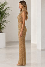 Side profile view of gold sequin crop top and skirt set