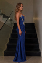 Side view of royal blue satin corset evening gown with high leg slit