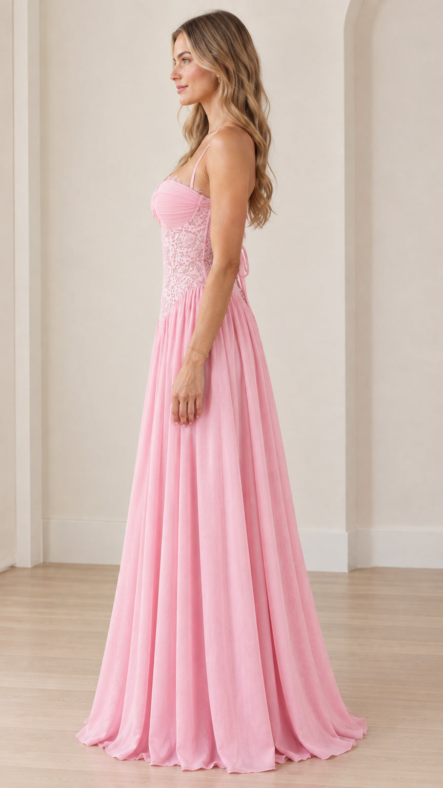 Side profile of woman wearing pink corset lace floor-length evening dress