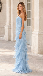 Side profile view of sky blue strapless tiered fringe evening gown