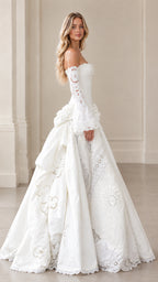 Side profile of ivory ball gown showing dramatic draped skirt volume and bell sleeve flare