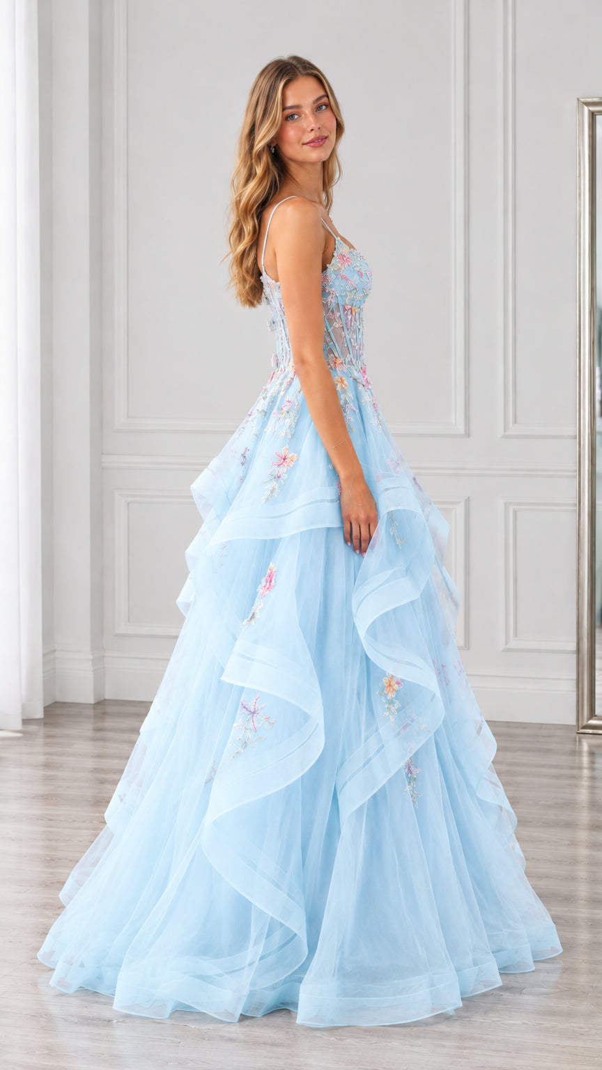 Side profile view of light blue tiered tulle formal dress with sweetheart neckline