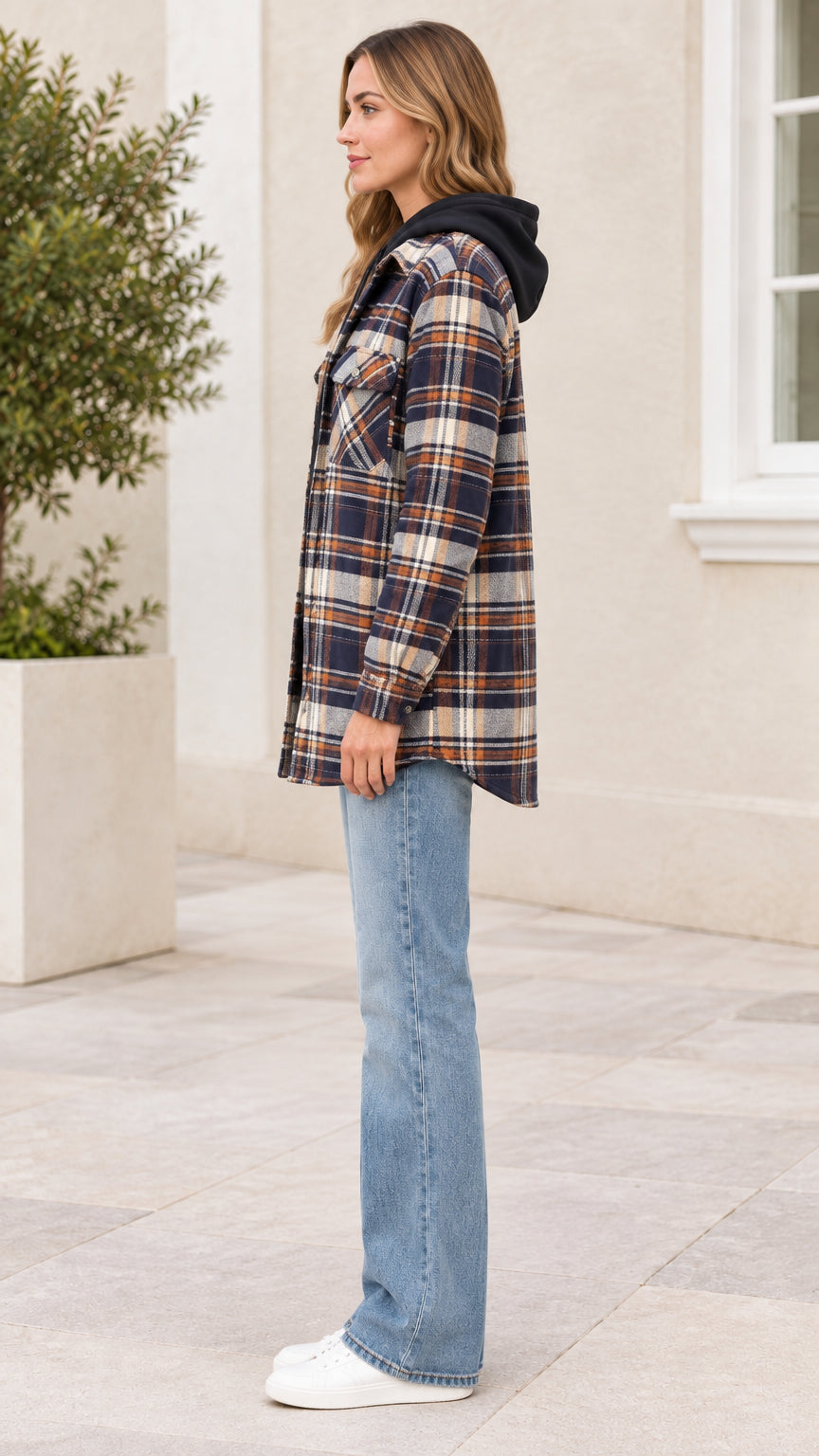 Side profile view of model wearing Navy plaid button-down hooded shacket