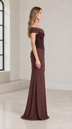 Side profile of chocolate brown floor-length formal gown with sequin bodice
