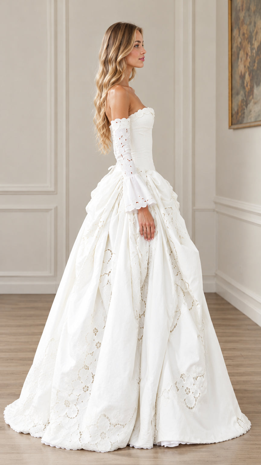 Side profile view of white off-the-shoulder corset ball gown showing volume and bell sleeves