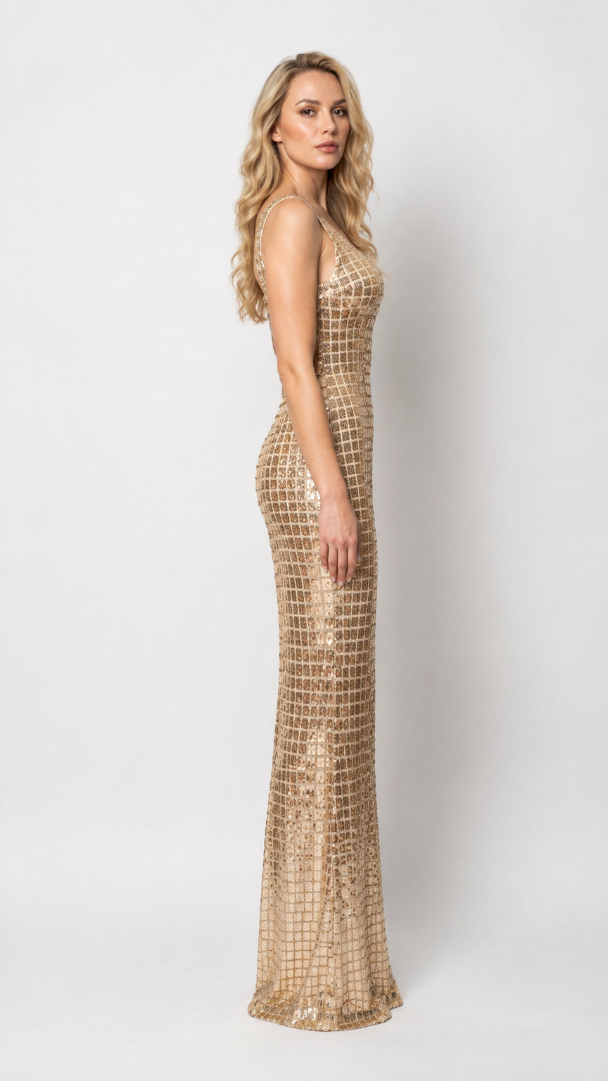 Side profile view of gold sleeveless sequin column evening dress