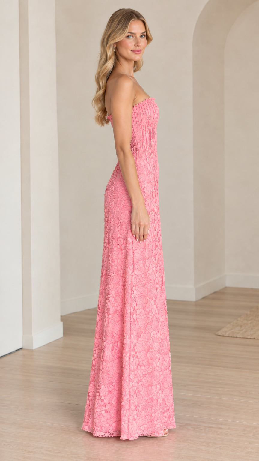 Side profile of pink strapless textured floral evening gown