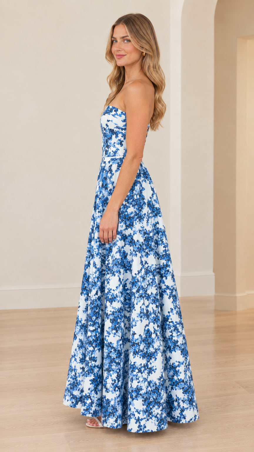 Side profile view of strapless blue and white floral evening dress