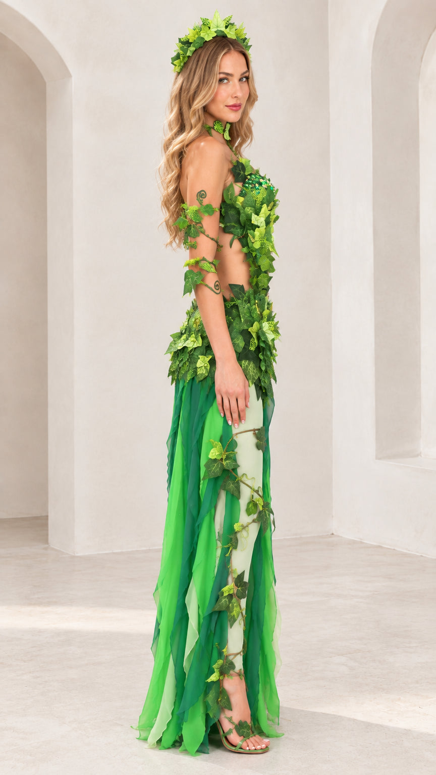 Side profile view of the green ivy costume showing layered skirt movement and vine details