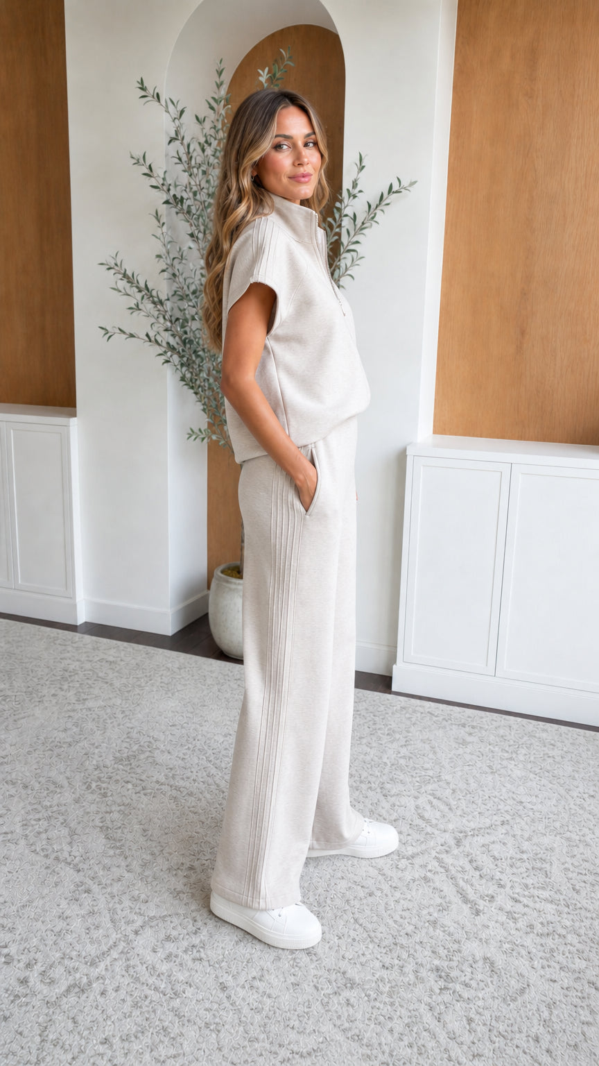 Side full-length view of oatmeal matching lounge set with pockets and cap sleeves