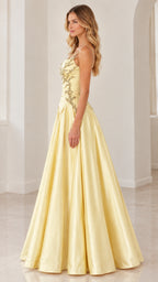 Side profile of model wearing pastel yellow satin ball gown with beaded bodice