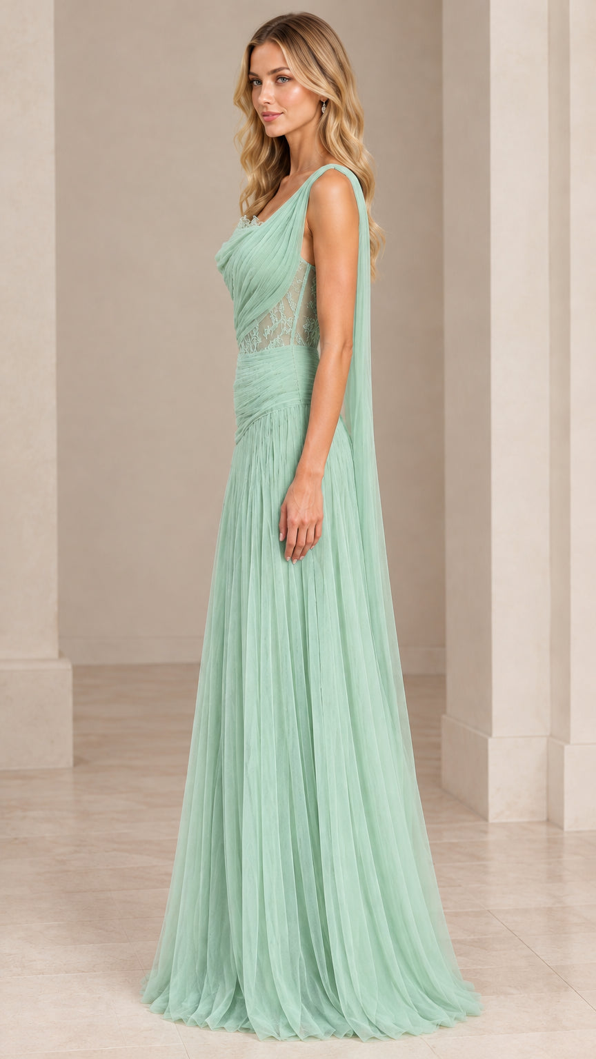 Side profile view of sage green one-shoulder lace bodice formal maxi dress