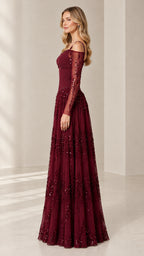 Side profile of burgundy formal sequin maxi gown with sheer illusion sleeves