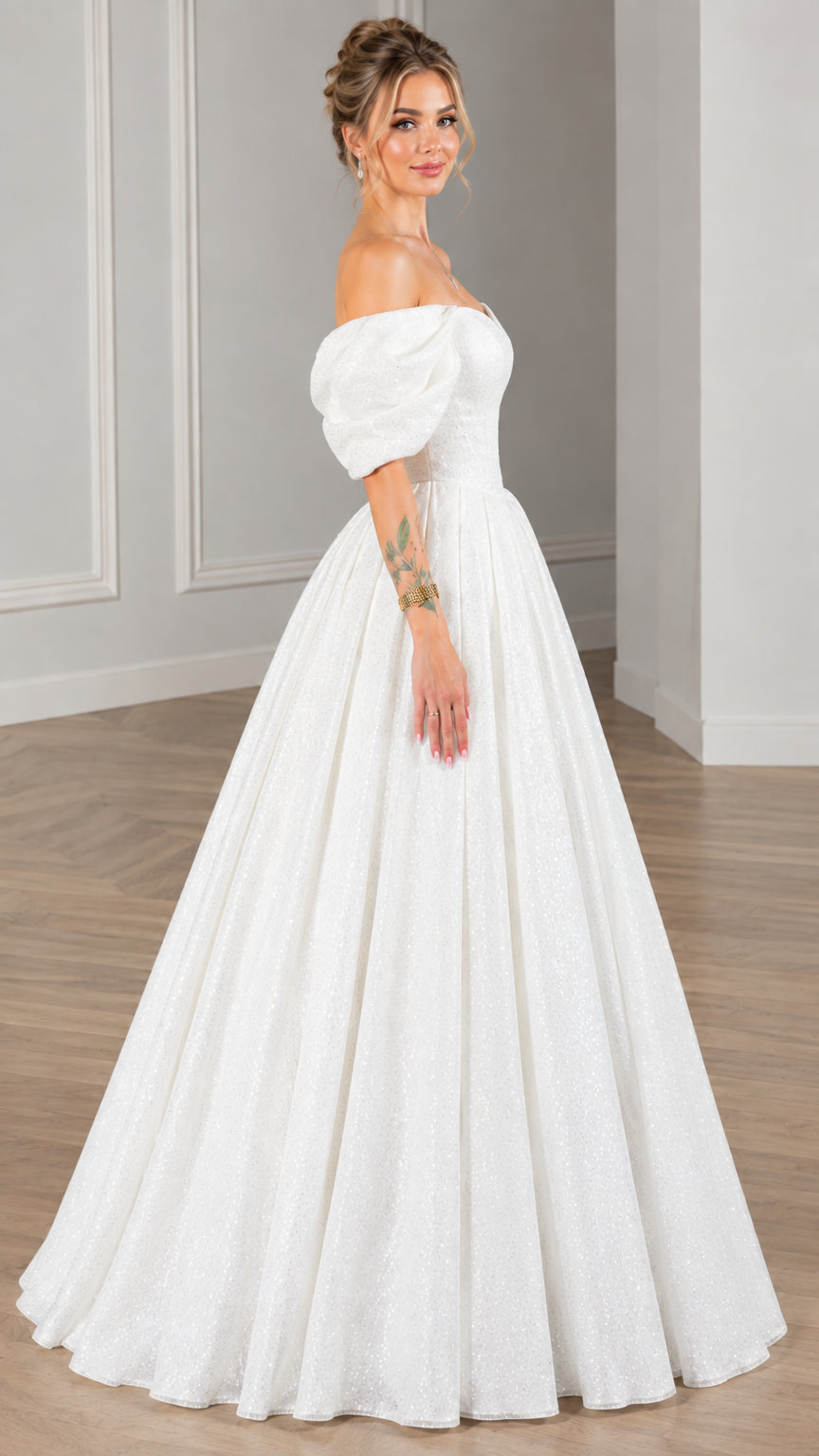 Side profile view of white off-the-shoulder pleated ball gown