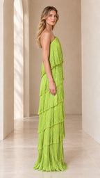 Side profile view of lime green tiered fringe strapless maxi dress