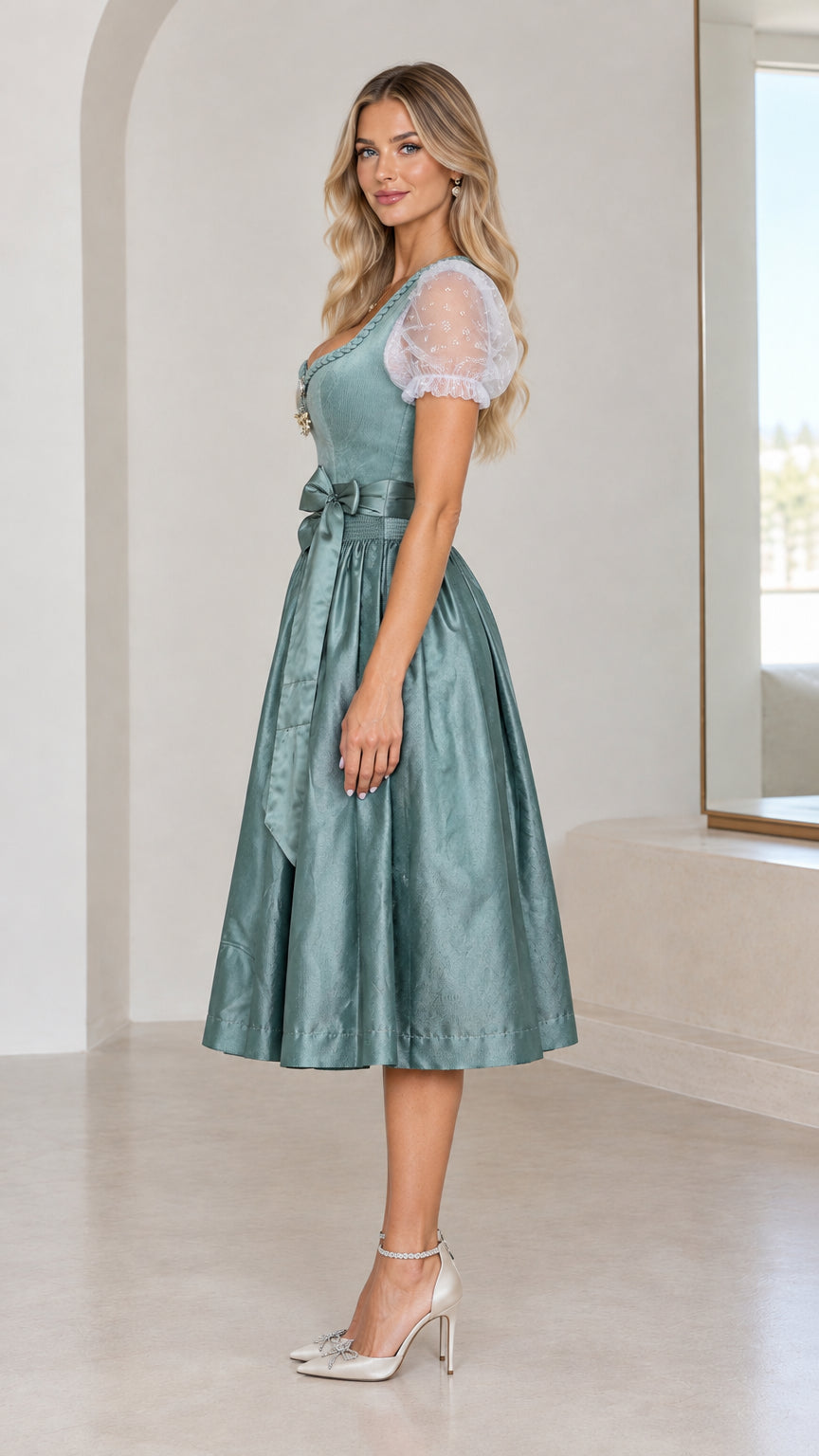 Side profile of sage green dirndl dress showing fitted bodice and gathered midi skirt