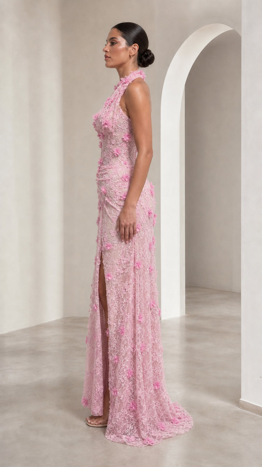Side profile of Blush Pink textured floral halter formal dress showing ruched details