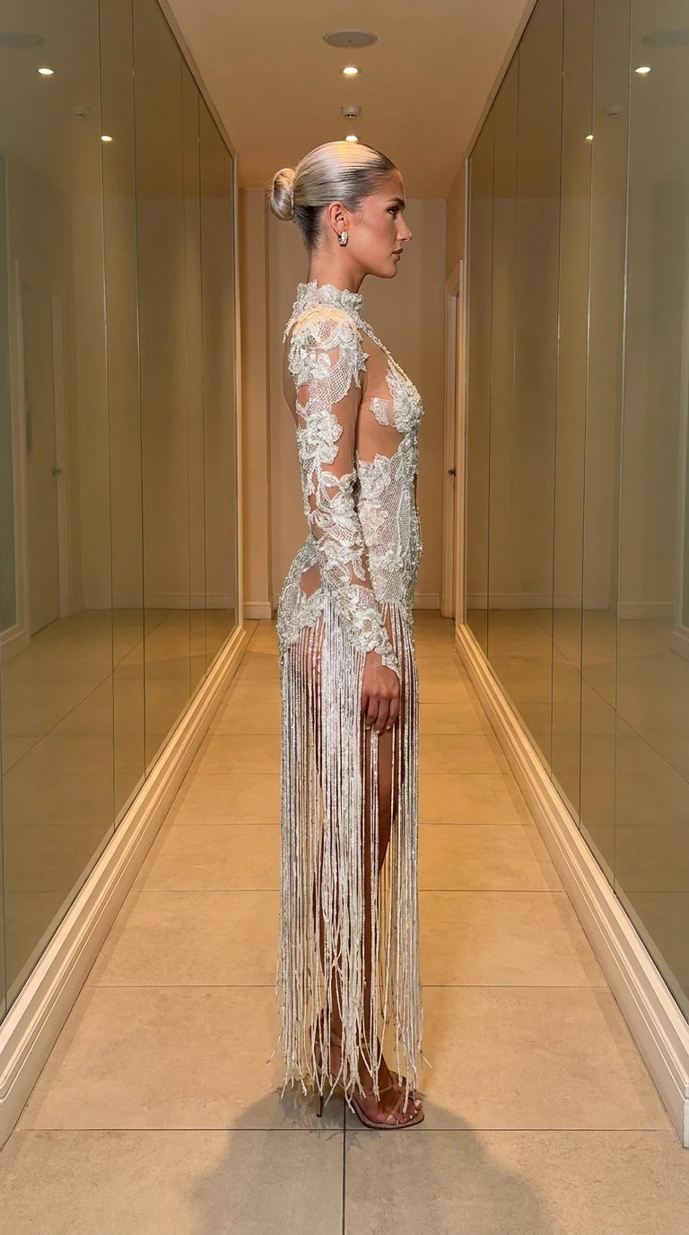 Ivory one-sleeve cutout fringe evening gown side profile view