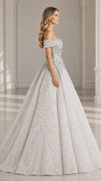 Side profile view of champagne beaded formal ball gown dress