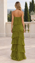 Back view of model wearing olive green strapless tiered fringe maxi dress
