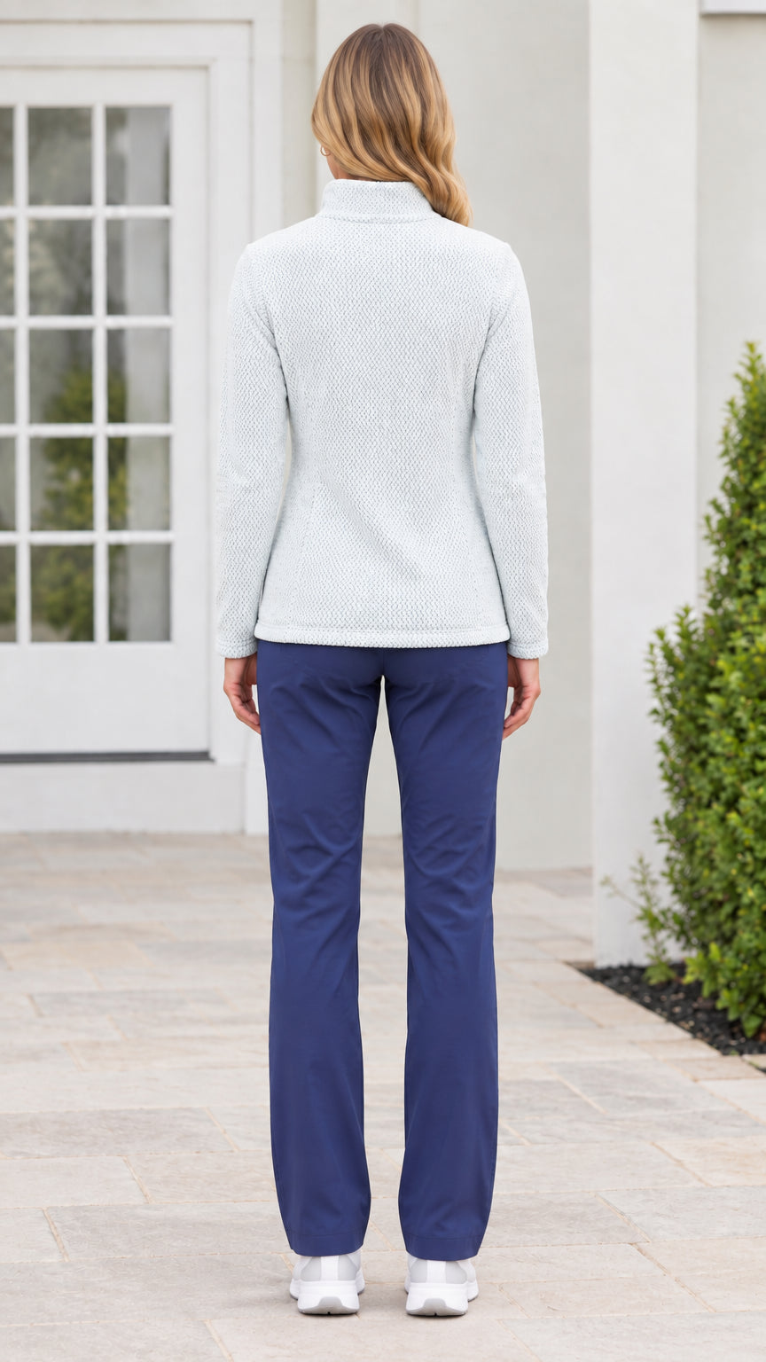 Back view of model wearing light blue textured fleece stand collar jacket