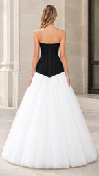 Back view of black and white strapless corset ball gown showing back boning and dropped waist