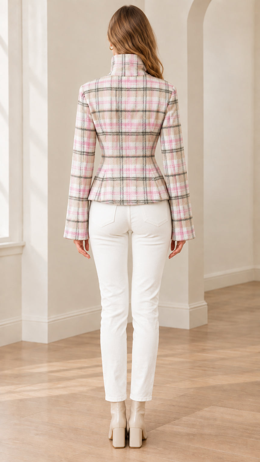 Back view of tailored pink plaid peplum jacket showing cinched waist